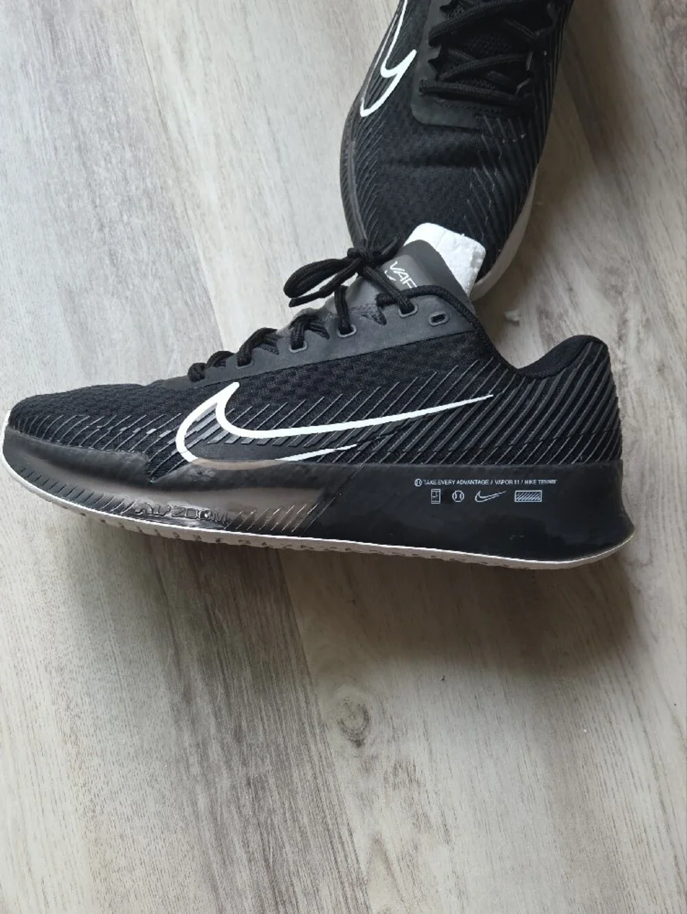 Nike Womans Black Sneakers with White Swoosh